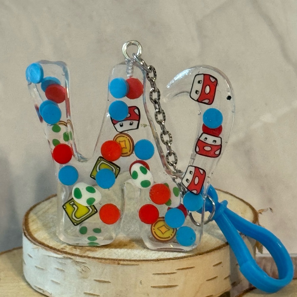 Letter W with video game inspired charms newly made.
